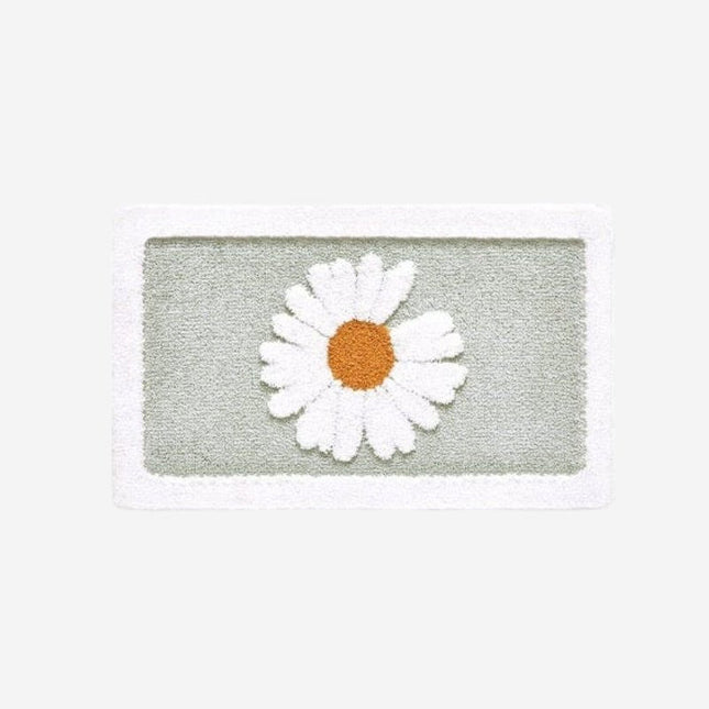 Imukykyinen ovimatto päivänkakkara kuviolla