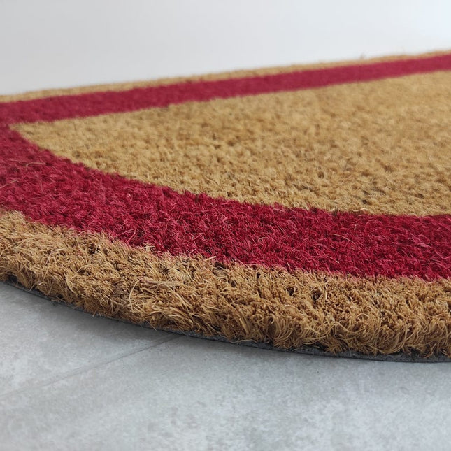 Puolikuun muotoinen kookos ovimatto