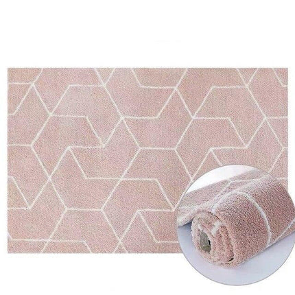 Puuterinpunainen pörrömatto geometrisella kuviolla