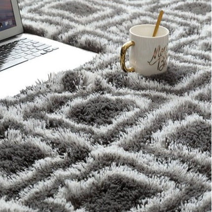 Tummanharmaa-valkoinen berber-pörrömatto