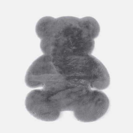 Tummanharmaa nallekarhun muotoinen matto