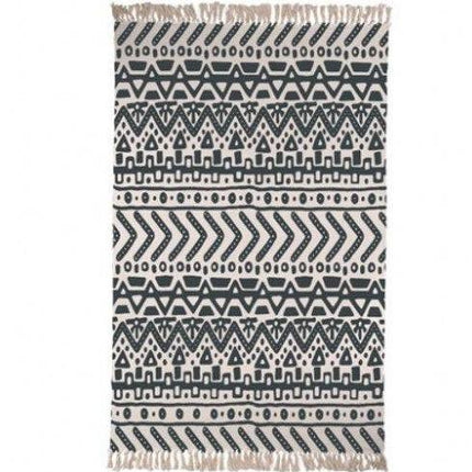 Puuvillamatto etnisillä kuvioilla ja hapsuilla