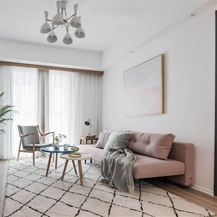 Valkoinen berberi-matto mustalla salmiakkikuviolla