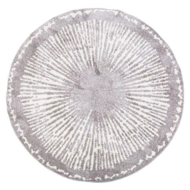 Pyöreä harmaa berberimatto modernilla kuviolla