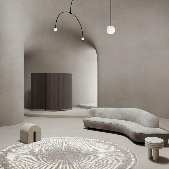 Pyöreä harmaa berberimatto modernilla kuviolla