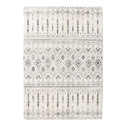 Kudottu berberimatto geometrisellä kuviolla