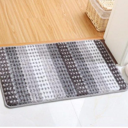 Paksu harmaasävyinen kylpyhuoneen matto