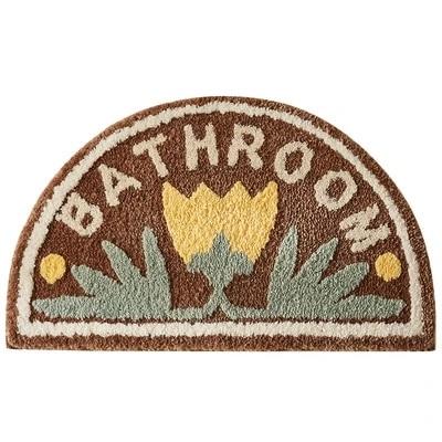 Puoliympyrä kylpymatto keltaisella kukalla