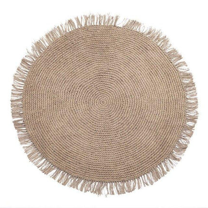 Pyöreä beige hapsullinen juuttimatto