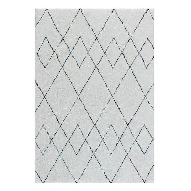 Valkoinen pehmeä berber-tyylinen matto