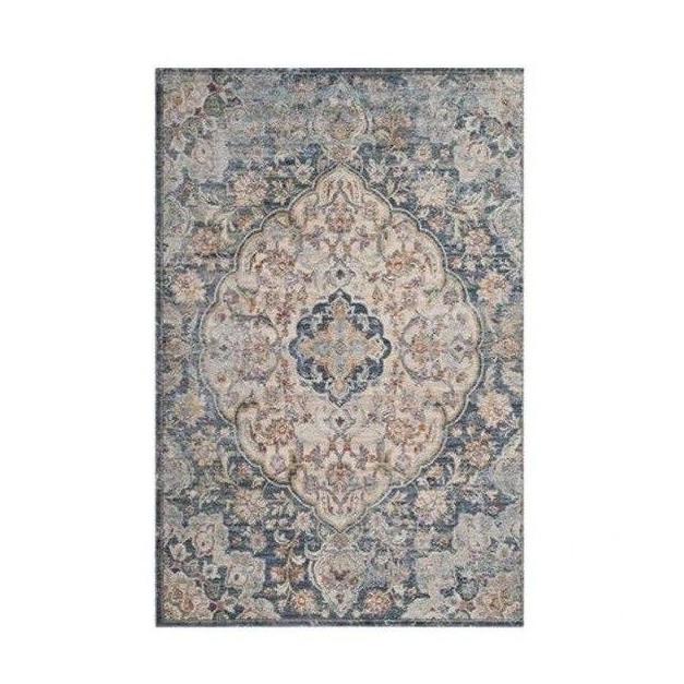 Vintage pakistanilaistyylinen matto olohuoneeseen