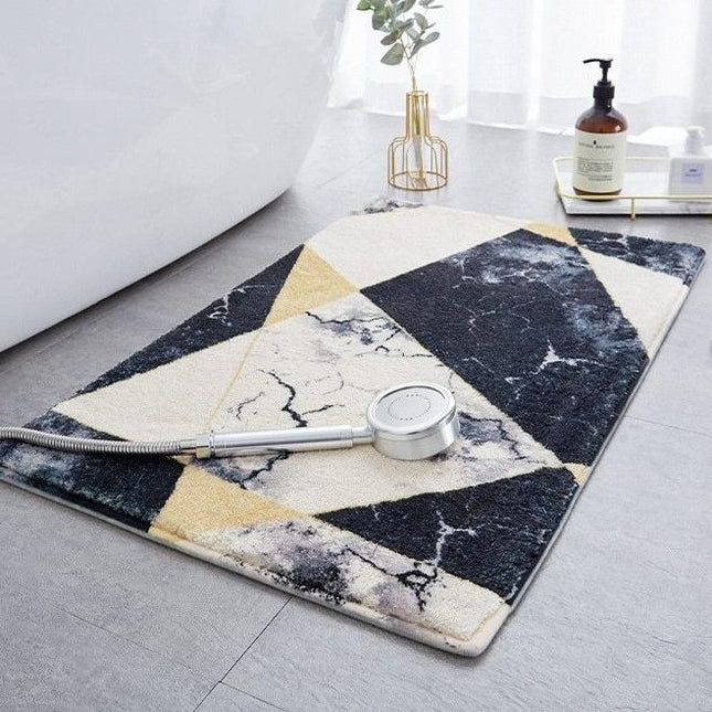 Geometrinen kylpymatto marmoriefektillä