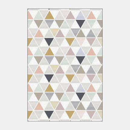 Skandinaavinen matto beigen sävyisillä kolmioilla