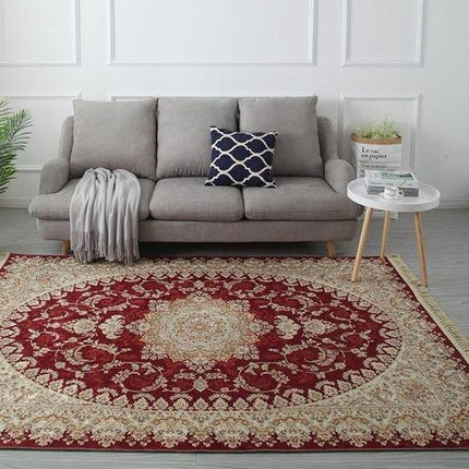 Punainen persialaistyylinen matto olohuoneeseen